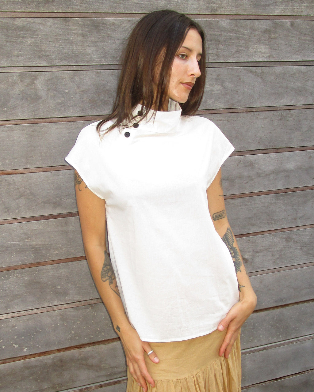 high neck asymmetrical button top