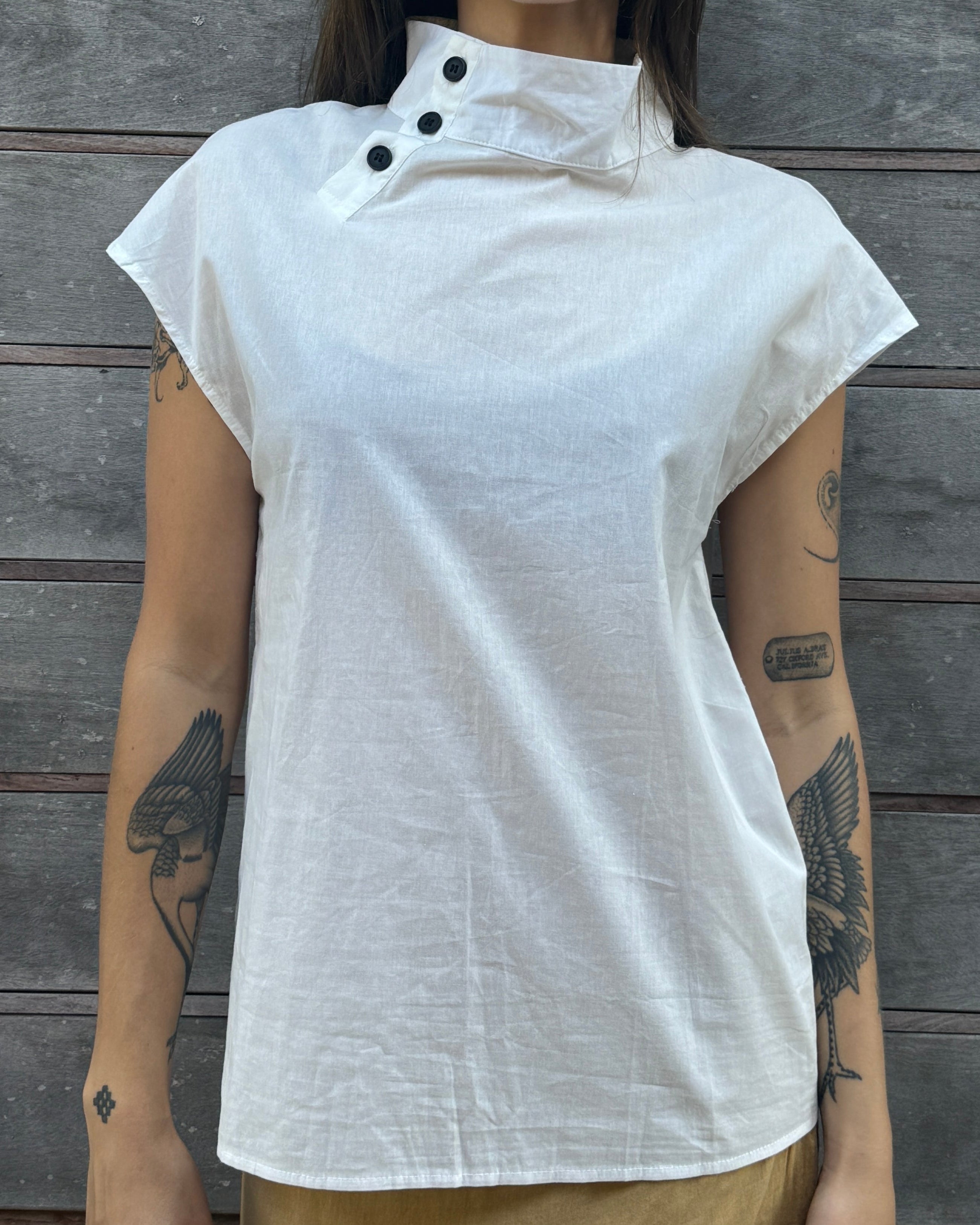 high neck asymmetrical button top